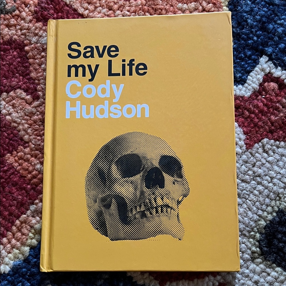Yellow 'Save my Life' Book by Cody Hudson